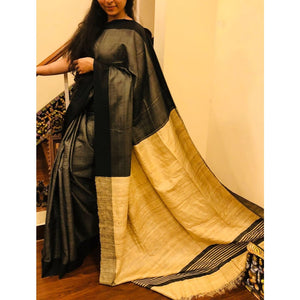 Handwoven pure Tussar silk saree with ghicha pallu in black and yellowish beige color - Tussar Silk Sarees