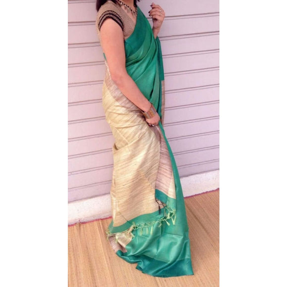 Handwoven pure Tussar silk saree with ghicha pallu in green and beige color - Tussar Silk Sarees